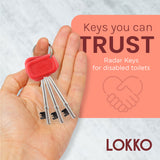 "Hand holding Lokko red radar keys set for disabled toilets, emphasizing trust and comfort with rubber grip handles."